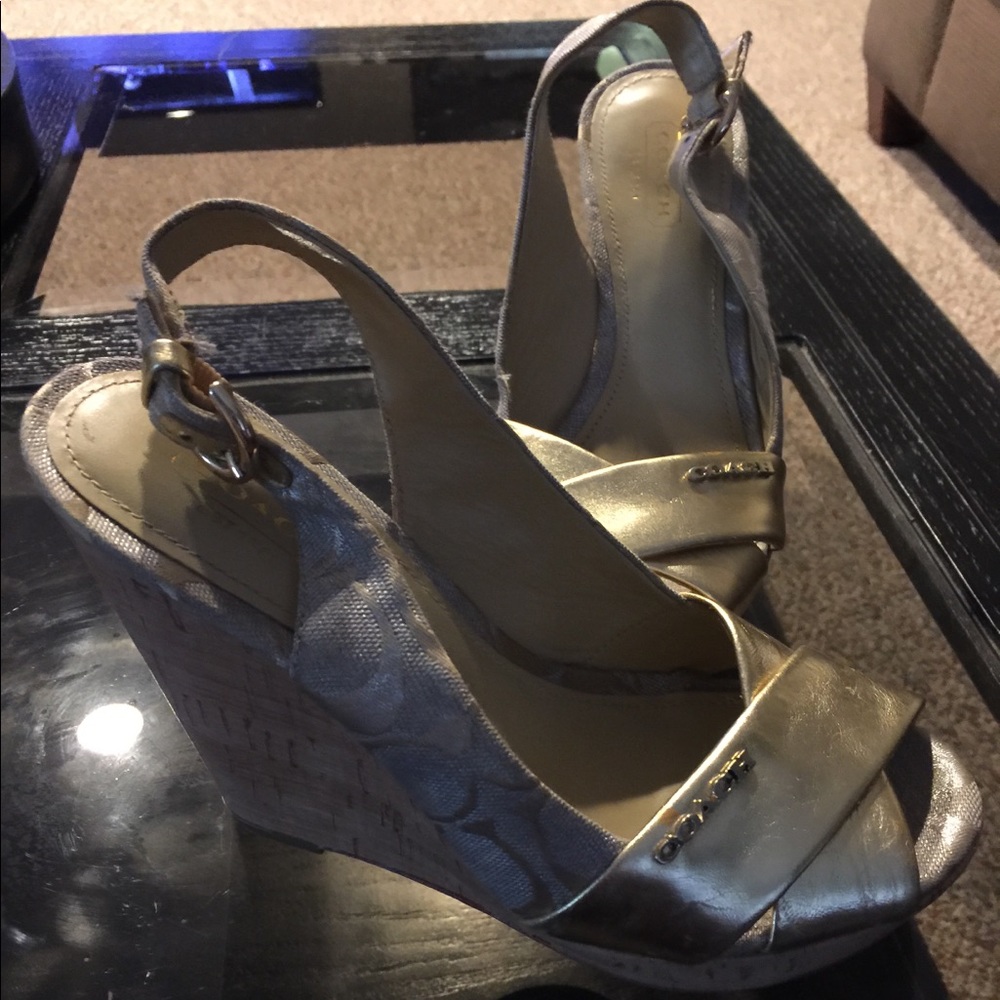 Coach gold wedges.